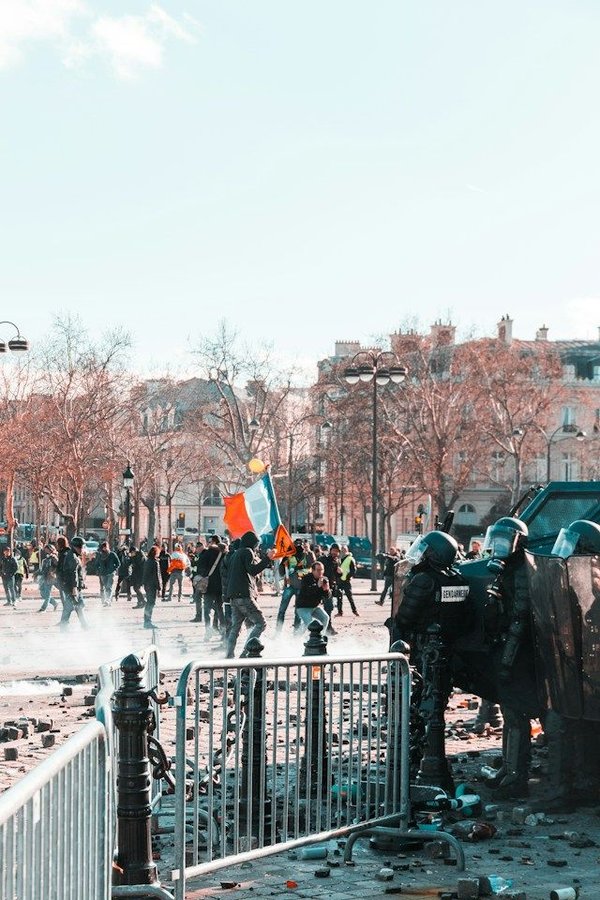 How can sports organizations address the issue of fan violence and hooliganism?